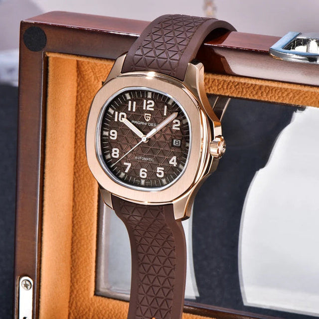 Luxury watch PD-YS031 with brown leather strap and gold casing on a wooden stand.