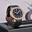 Luxury watch PD-YS031 with rose gold case and black strap on a textured surface