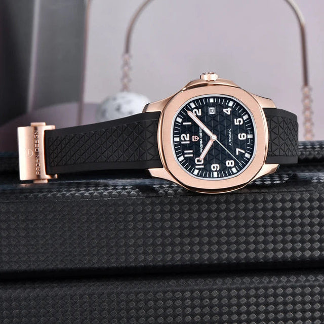 Luxury watch PD-YS031 with black strap and rose gold case on a textured surface