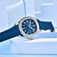 PD-YS031 Blue watch with a textured strap on a light blue background
