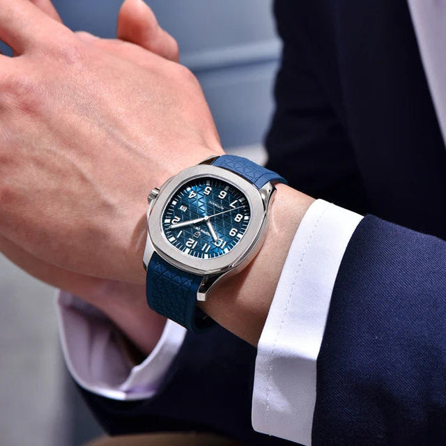 Person wearing a PD-YS031 with a blue strap and blue dial, dressed in formal attire.